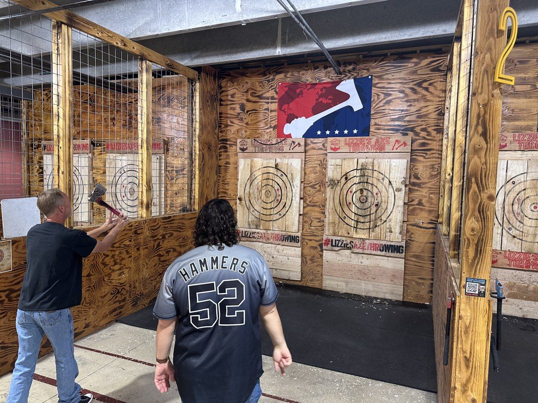 Dannenberg, left, and Hammers throw adjacent lanes. Competitors switch targets at the halfway point of every game. Rico Vecchiarelli / AXEOLOGY