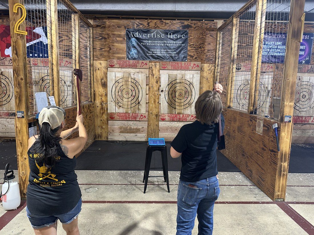 Tina Rivera-Locklear, left, and Aidan Valois throw during the August 1 marathon. Rivera-Locklear is one of three owners at Lizzie's and set up the day's events. Rico Vecc